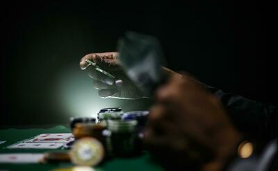 Selective focus photography of poker chips.