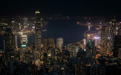 Lot of skyscrapers in Hong Kong during night.