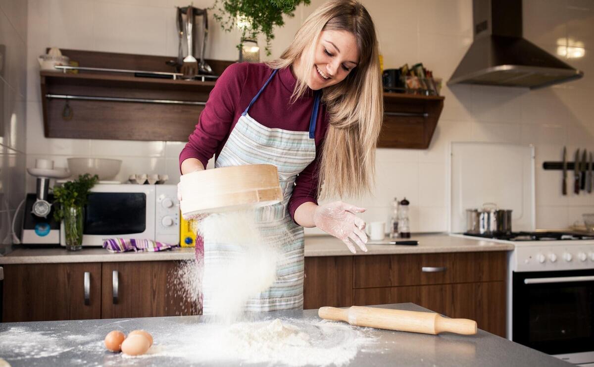 Woman baking in her beautiful kitchen.