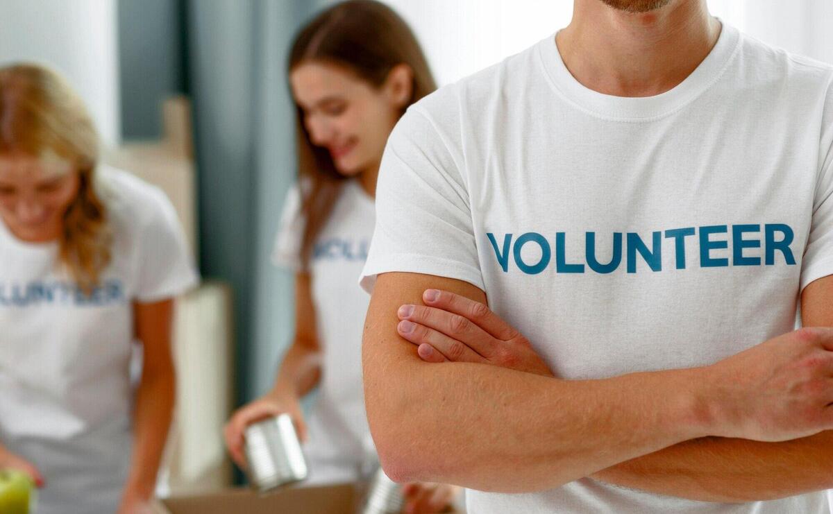 Volunteers at work preparing donations