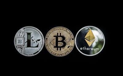 3 different illustration of cryptocurrency coins.