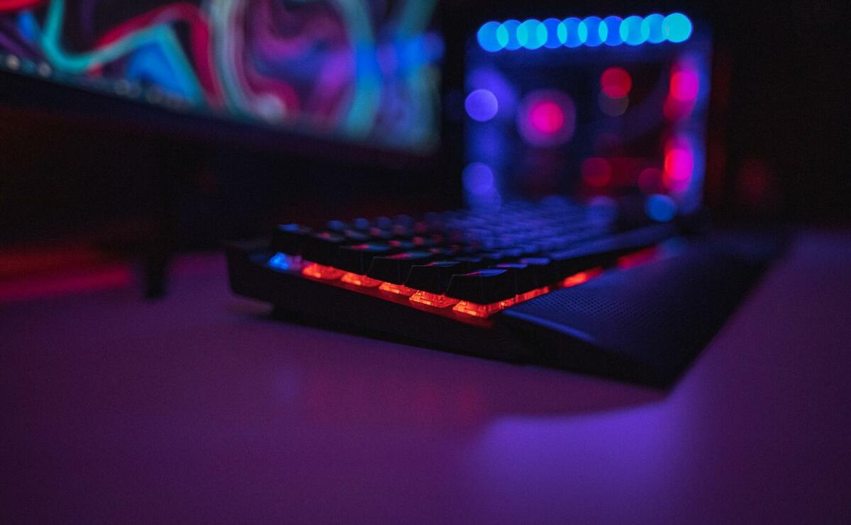 A computer keyboard, with lot of lights.