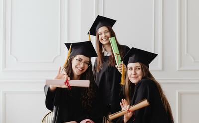 Young women in their graduation toga